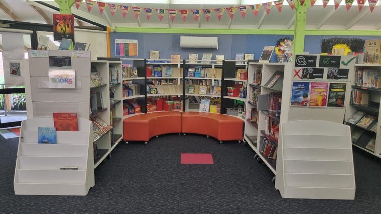 library with bookshelves and books