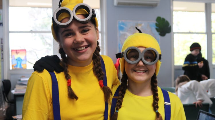 2 students dressed up as minions