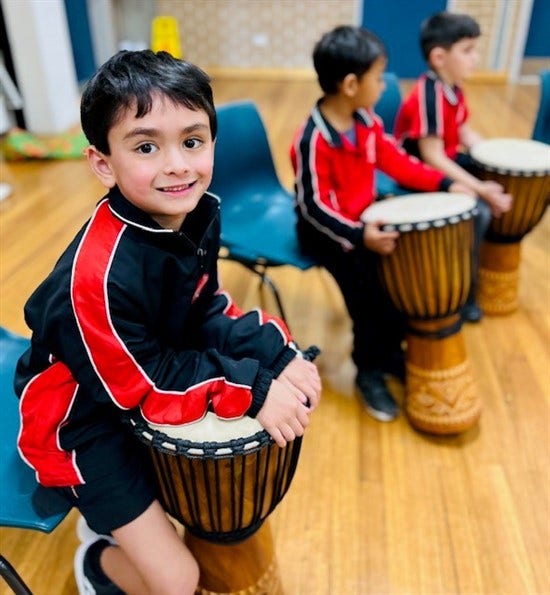 students playing drums
